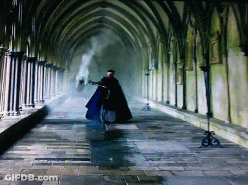 Man In Cape Walking GIF