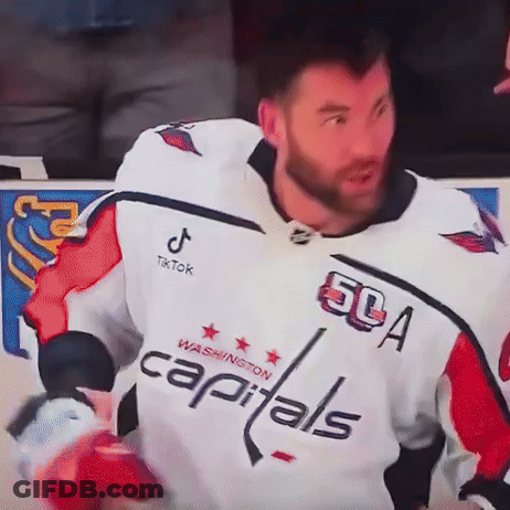 Man In Capitals Jersey On Hockey Rink GIF