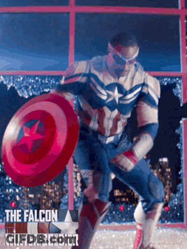 Man In Captain America Costume Holding Red Shield GIF