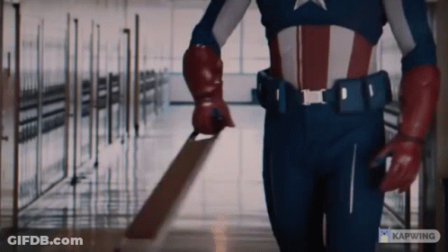 Man In Captain America Costume Holding Sword GIF