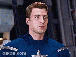 Man In Captain America Costume Looking At Camera GIF