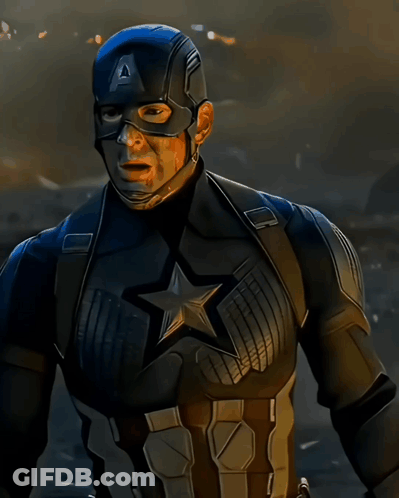 Man In Captain America Costume Standing In Field GIF