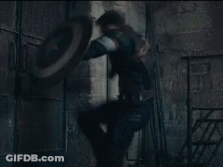 Man In Captain America Uniform Holding Shield GIF