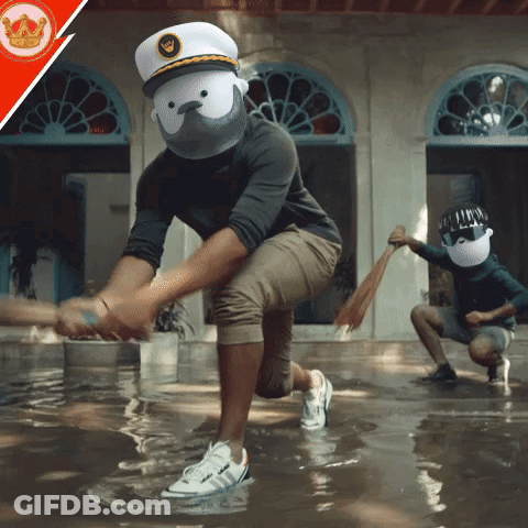 Man In Captain's Hat Kneeling In Water GIF