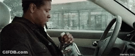 Man In Car Holding Water Bottle GIF