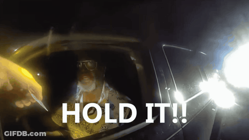 Man In Car Saying Hold It GIF