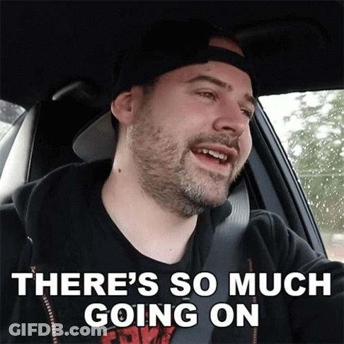 Man In Car Saying There's So Much Going On GIF