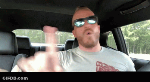 Man In Car Wearing Coffee Shirt GIF
