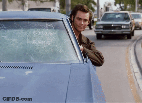 Man In Car With Broken Windshield GIF