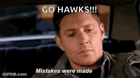 Man In Car With Go Hawks Mistakes Were Made On Face GIF