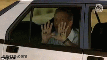 Man In Car With Hands Painted Aiu To GIF