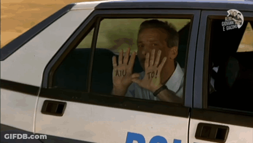 Man In Car With Hands Painted Aiu To GIF