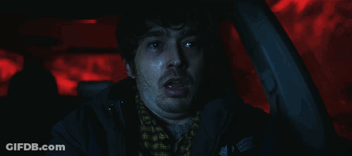 Man In Car With Liberty Mutual Jacket GIF