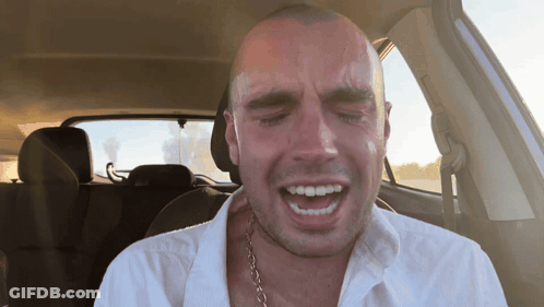 Man In Car With Mouth Open GIF