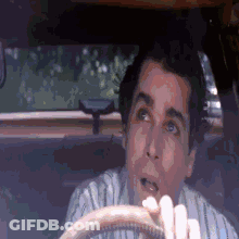 Man In Car With Mouth Open GIF