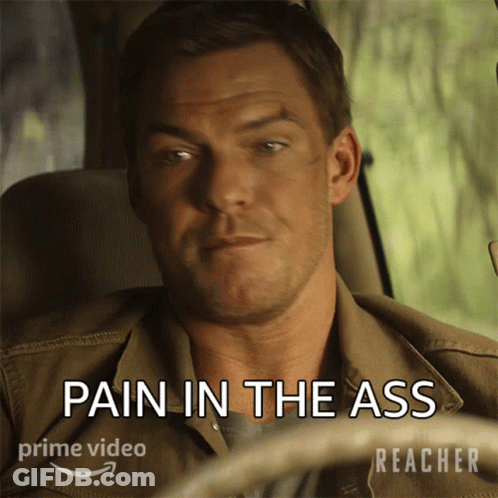 Man In Car With Pain In The Ass GIF