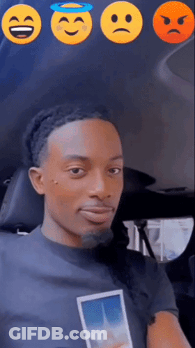 Man In Car With Smiley Faces Holding Phone GIF
