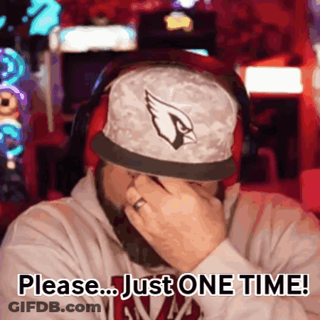 Man In Cardinals Hat Covering Face GIF