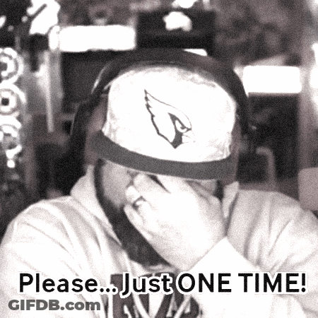 Man In Cardinals Hat Covering Face With Hand GIF