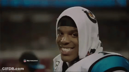 Man In Carolina Panthers Jersey Eating Hamburger GIF