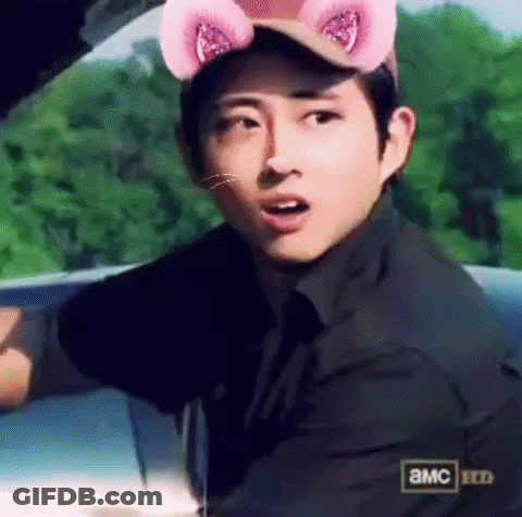Man In Cat Hat With Pink Ears Sitting In Car GIF