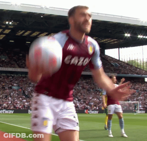 Man In Cazo Jersey Holding Ball GIF