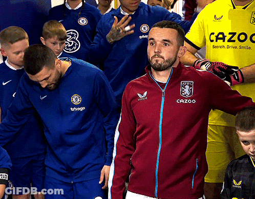 Man In Cazoo Jacket In Line With Players GIF