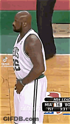 Man In Celtics Jersey On Basketball Court GIF