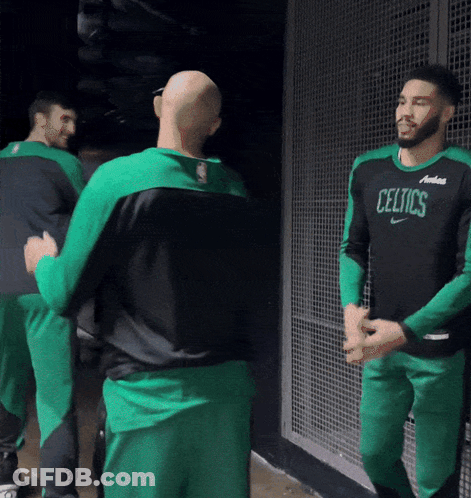 Man In Celtics Jersey Talking To Another Man GIF