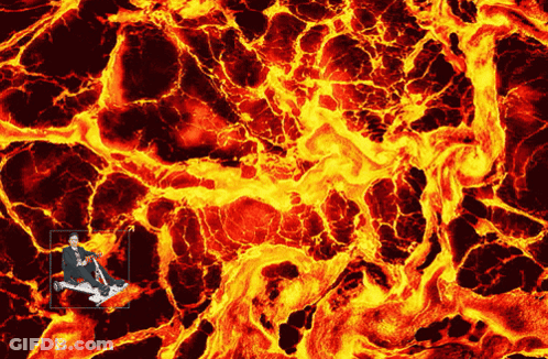 Man In Chair Before Lava Painting GIF