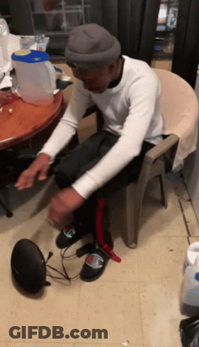 Man In Chair Feet On Speaker Saying Champion GIF