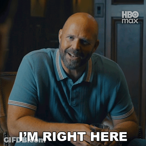 Man In Chair With Whiskey Saying I'm Right Here GIF