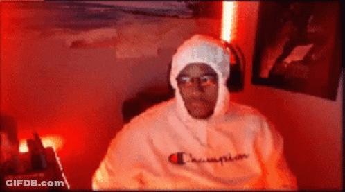 Man In Champion Hoodie And Headphones GIF