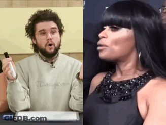 Man In Champion Sweatshirt Next To Woman GIF