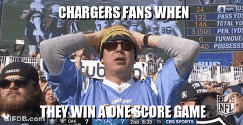Man In Chargers Jersey Holding Head GIF
