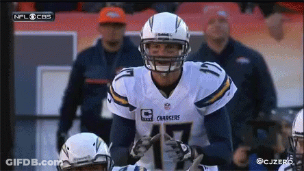 Man In Chargers Jersey Looking At Camera GIF