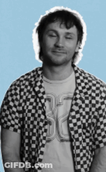 Man In Checkered Shirt With SD T-Shirt GIF