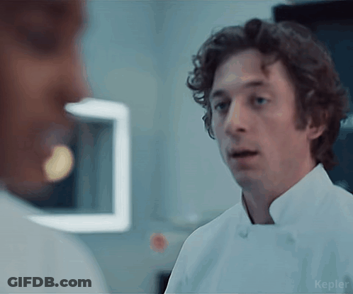 Man In Chef Coat Talking GIF