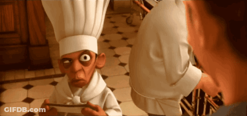 Man In Chef Hat Looking At Man In White Shirt GIF