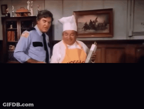 Man In Chef Hat Next To Man In Apron Hogge Time GIF
