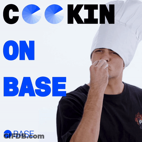 Man In Chef Hat Sniffing Nose In Front Of Cockin On Base Sign GIF