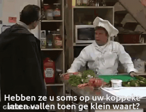 Man In Chef Hat Talks To Another Man GIF