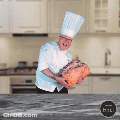 Man In Chef's Hat Holding Large Piece Of Meat GIF