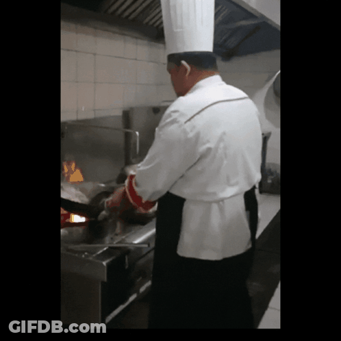 Man In Chef's Hat Preparing Food GIF
