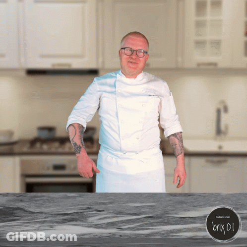 Man In Chef Uniform At Kitchen Counter GIF