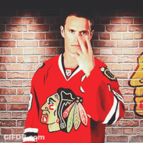 Man In Chicago Blackhawks Jersey Holding Nose GIF