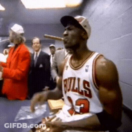 Man In Chicago Bulls Jersey Smoking Cigar GIF