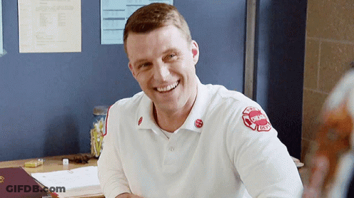Man In Chicago Fire Department Uniform Smiling GIF