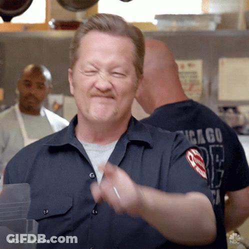 Man In Chicago Shirt Making A Face GIF