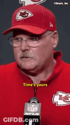 Man In Chiefs Hat Talking Into NFL Microphone GIF